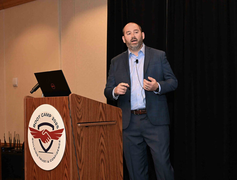 Man speaking about training on design to elevate performance.